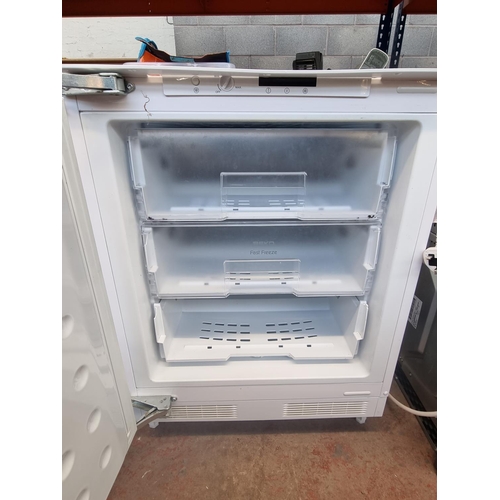 1579 - A Beko BZ31 integrated freezer