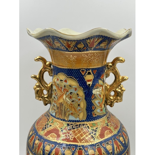 1165 - A Chinese porcelain twin handled vase - approx. 40cm high