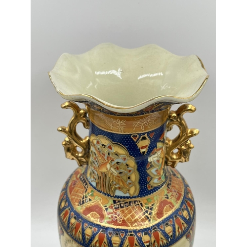 1165 - A Chinese porcelain twin handled vase - approx. 40cm high