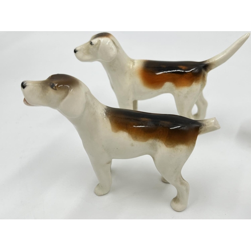 1167 - Five Beswick figurines, one Rearing Huntsman model no. 868 and four hunting hounds