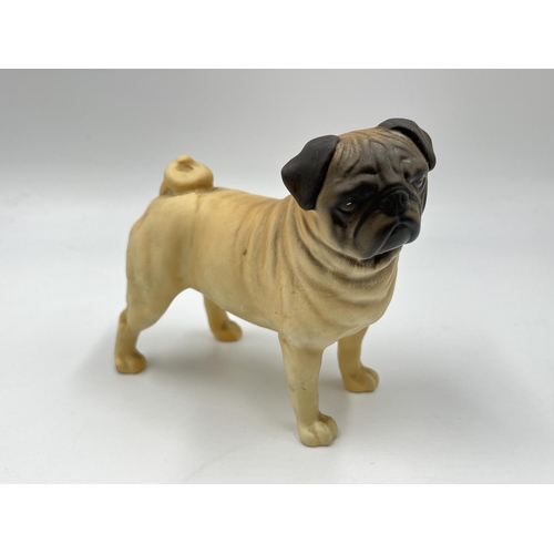 1168 - A Beswick CH. Cutmil Cupie pug figurine - approx. 10.5cm high x 12cm long