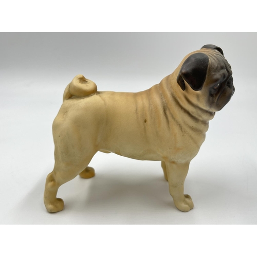 1168 - A Beswick CH. Cutmil Cupie pug figurine - approx. 10.5cm high x 12cm long