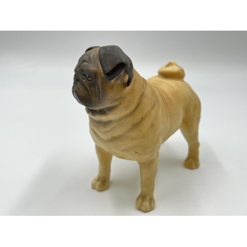 1168 - A Beswick CH. Cutmil Cupie pug figurine - approx. 10.5cm high x 12cm long