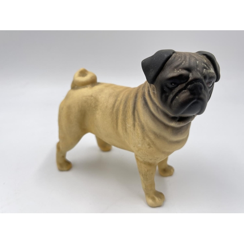 1169 - A Beswick CH. Cutmil Cupie pug figurine - approx. 10.5cm high x 12cm long