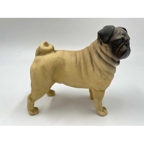 1169 - A Beswick CH. Cutmil Cupie pug figurine - approx. 10.5cm high x 12cm long