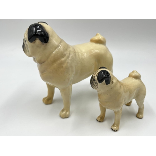 1170 - Two Beswick pug figurines, one being CH. Cutmil Cupie