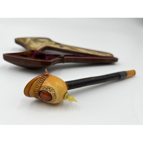 2261 - Three leather cased carved Meerschaum smoking pipes with hallmarked sterling silver collars and ambe... 