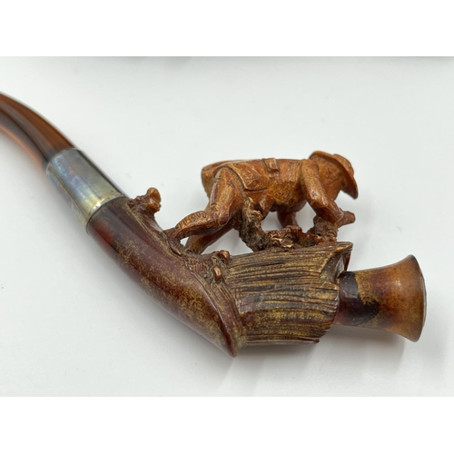 2261 - Three leather cased carved Meerschaum smoking pipes with hallmarked sterling silver collars and ambe... 