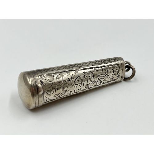 2262 - Two cheroot holders, one hallmarked Birmingham silver - dated 1911 and one cased Meerschaum with amb... 