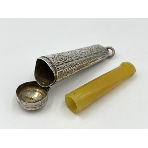 2262 - Two cheroot holders, one hallmarked Birmingham silver - dated 1911 and one cased Meerschaum with amb... 