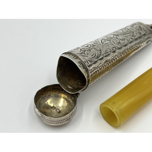 2262 - Two cheroot holders, one hallmarked Birmingham silver - dated 1911 and one cased Meerschaum with amb... 