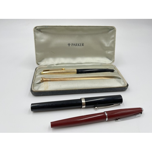 2263 - Four vintage writing instruments, two Parker fountain pens, one Sheaffer fountain pen and one Venus ... 