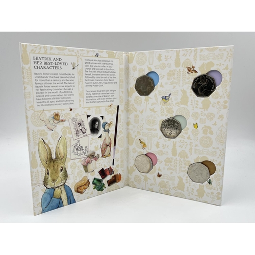 2266 - Forty four British commemorative coins to include fourteen £2 coins, The Royal Mint Beatrix Potter 1... 