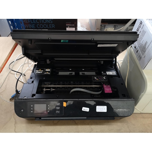 1544K - Three items, one HP Envy 4502 printer/scanner/copier, one Samsung ML-2010 Mono laser printer with bo... 