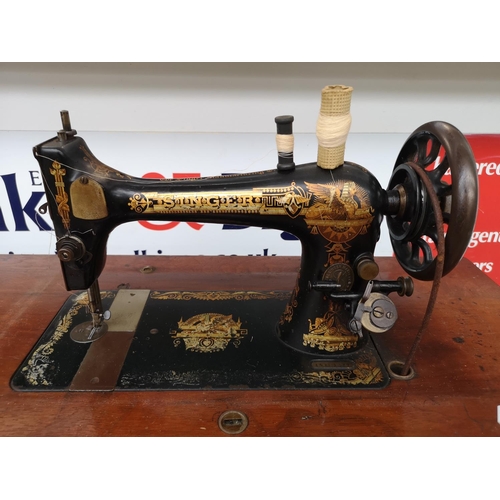 1545 - A 19th century Singer treadle sewing machine - serial no. 15119 637 with accessories