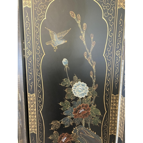 1007A - A black lacquered and hand painted four section folding dressing screen/room divider - approx. 183cm... 