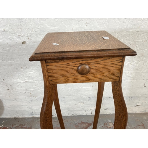 1035A - Two items, one early 20th century oak two tier plant stand - approx. 91cm high and one early 20th ce... 