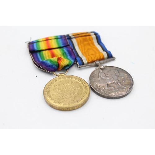 1131 - Two WWI medals with original ribbons presented to 265792 PTE T.I Metcalfe - South Lancs Regt