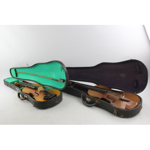 836 - Two cased vintage violins, one Lark and one Leslie Sheppard