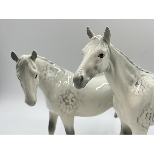 252 - Two Beswick dapple grey horse figurines - tallest approx. 20cm high