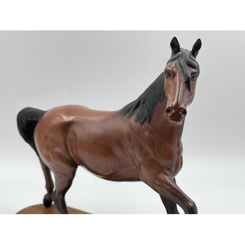 254 - A Beswick Spirit of The Wind matte ceramic horse figurine on plinth - approx. 23.5cm high x 24cm lon... 