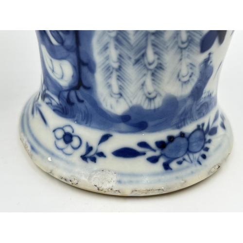 256 - Three pieces of Chinese blue and white ceramics, two 19th century 18cm baluster vases with Kangxi re... 