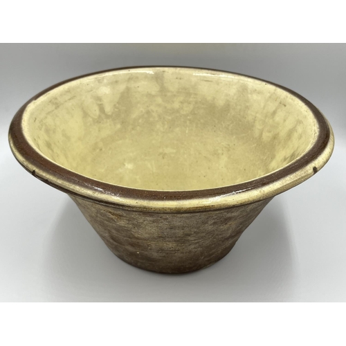 261 - A glazed earthenware dairy bowl - approx. 15cm high x 31cm diameter