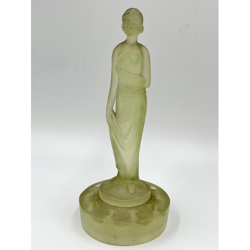 265 - Two frosted glass figurines comprising Muller & Co green uranium and one purple Aphrodite - approx. ... 