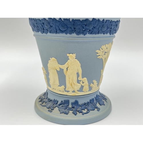 273 - Two Wedgwood tri coloured blue Jasperware vases, one being boxed - largest approx. 15.5cm high