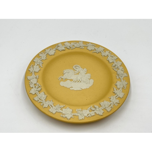 293 - Two pieces of Wedgwood Jasperware, one yellow Chariot design trinket dish - approx. 11cm diameter an... 