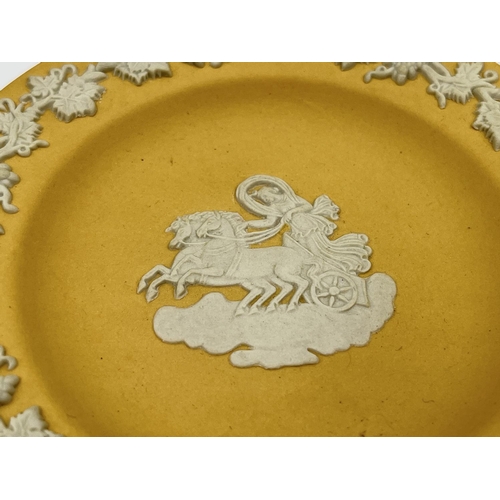 293 - Two pieces of Wedgwood Jasperware, one yellow Chariot design trinket dish - approx. 11cm diameter an... 