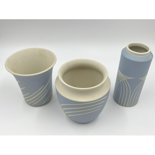 294 - Three Wedgwood Symmetry pattern pale blue Jasperware vases - largest approx. 12cm high