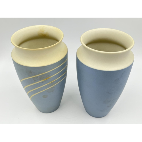 295 - Two Wedgwood Symmetry pattern pale blue Jasperware vases - approx. 17cm high