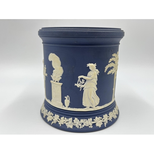 298 - Three pieces of Wedgwood Portland blue Jasperware - largest approx. 15cm high