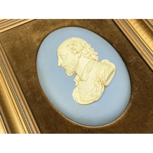 300 - Three framed Wedgwood pale blue Jasperware plaques - largest approx. 24cm high x 19cm wide