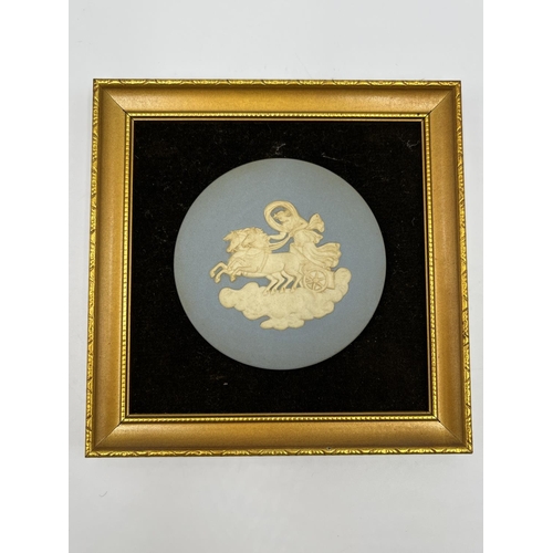 300 - Three framed Wedgwood pale blue Jasperware plaques - largest approx. 24cm high x 19cm wide