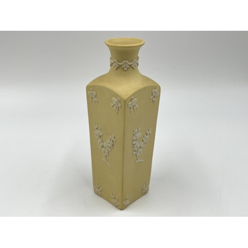 304 - Two Wedgwood primrose yellow Prunus Blossom vases - largest approx. 14cm high