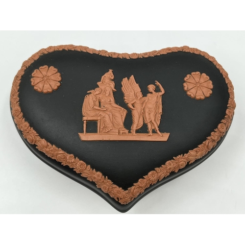 306 - Two pieces of Wedgwood terracotta and black Jasperware, one heart shaped trinket box and one boxed m... 