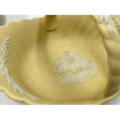 307 - A pair of Wedgwood primrose yellow Jasperware handled baskets - approx. 15cm x 10cm