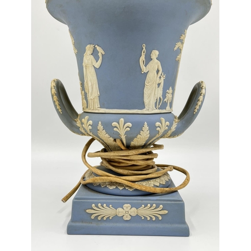 308 - A Wedgwood pale blue Jasperware Campana shaped table lamp - approx. 34cm high