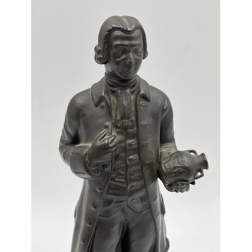 321 - A Wedgwood black basalt Josiah Wedgwood figurine - approx. 22cm high