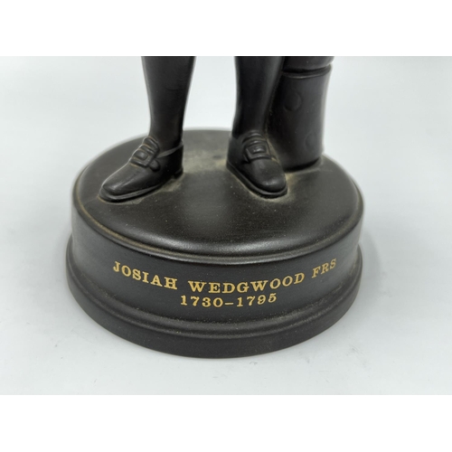 321 - A Wedgwood black basalt Josiah Wedgwood figurine - approx. 22cm high