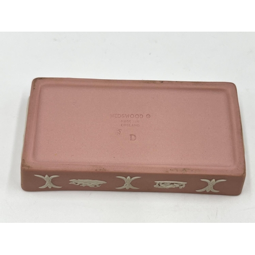 323 - Four Wedgwood pink Jasperware trinket boxes and dishes