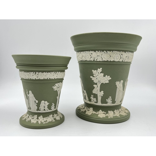 325 - Two Wedgwood sage green Jasperware vases and frogs - largest approx. 17cm high