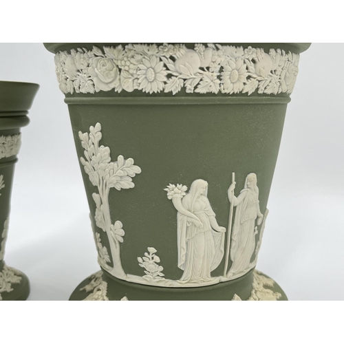 325 - Two Wedgwood sage green Jasperware vases and frogs - largest approx. 17cm high