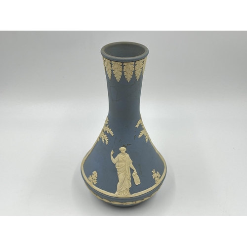 327 - A Wedgwood pale blue Jasperware vase - approx. 19cm high