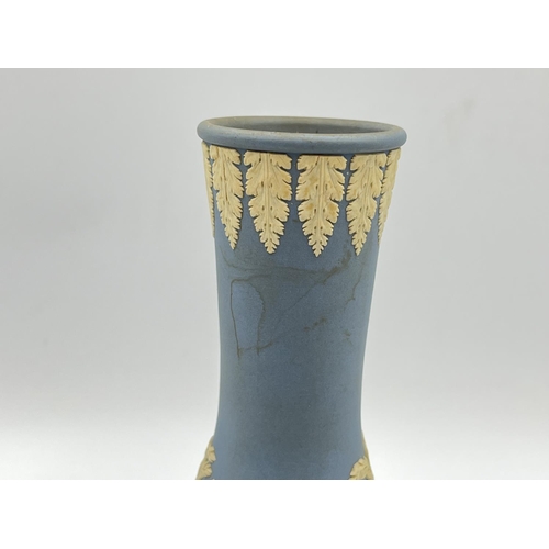 327 - A Wedgwood pale blue Jasperware vase - approx. 19cm high