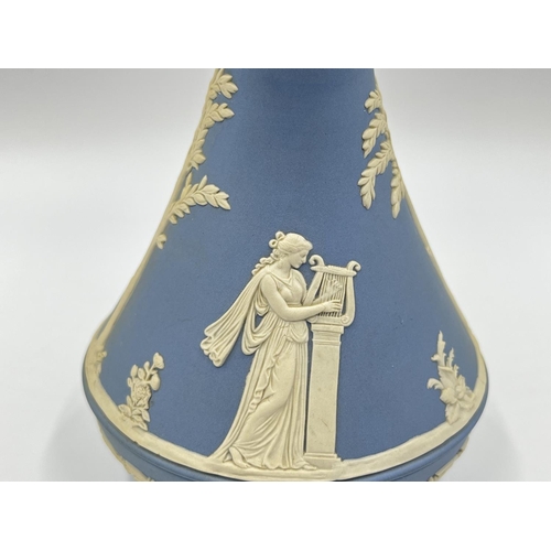 327 - A Wedgwood pale blue Jasperware vase - approx. 19cm high