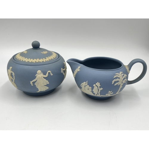 330 - Three pieces of Wedgwood pale blue Jasperware, teapot, sugar bowl and milk jug