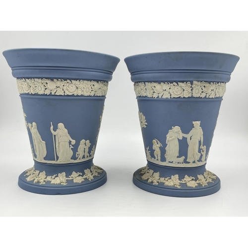 332 - A pair of Wedgwood pale blue Jasperware vases and frogs - approx. 17cm high